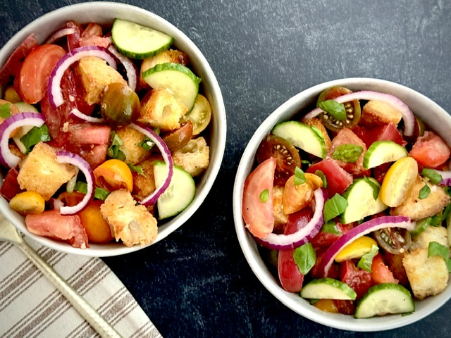 panzenella salad in 2 white bowls